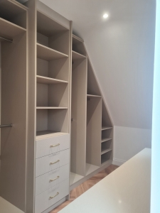 soft tone built in fitted wardrobe for loft conversion